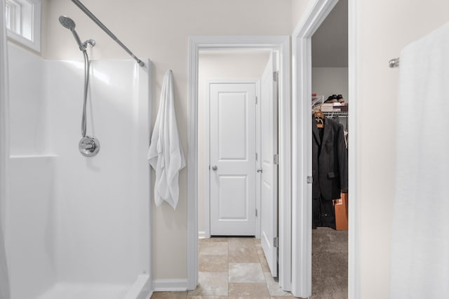 bathroom with a shower