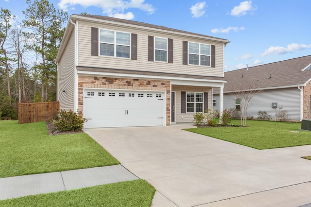 view of front of property with a front lawn and a garage