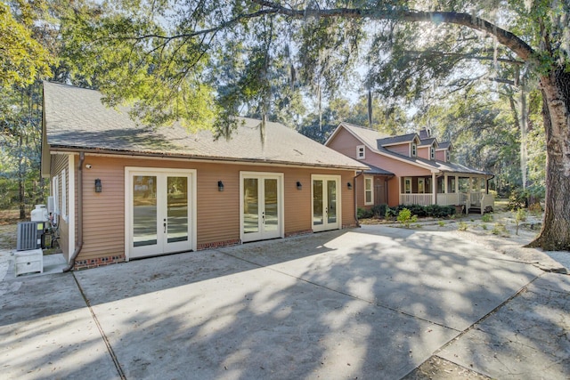 4429 Francis Younge Way, Hollywood, SC 29449 - back of house featuring central air condition unit and french doors