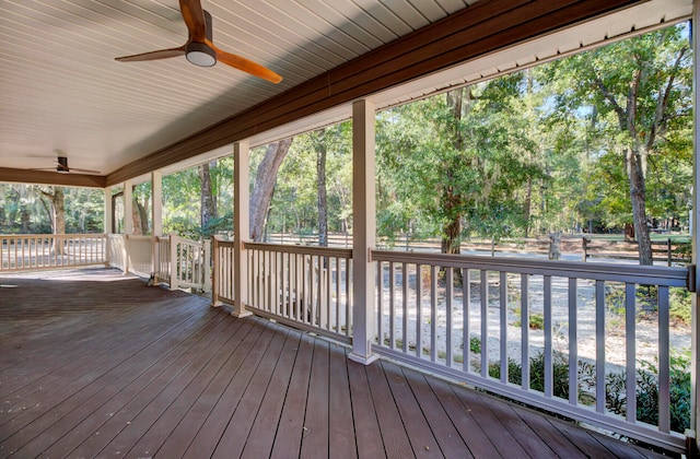 wooden deck with ceiling fan