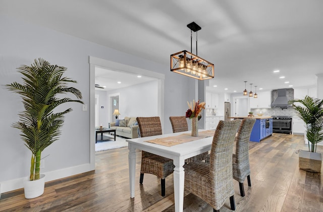 4429 Francis Younge Way, Hollywood, SC 29449 - dining space featuring wood-type flooring, recessed lighting, baseboards, and an inviting chandelier