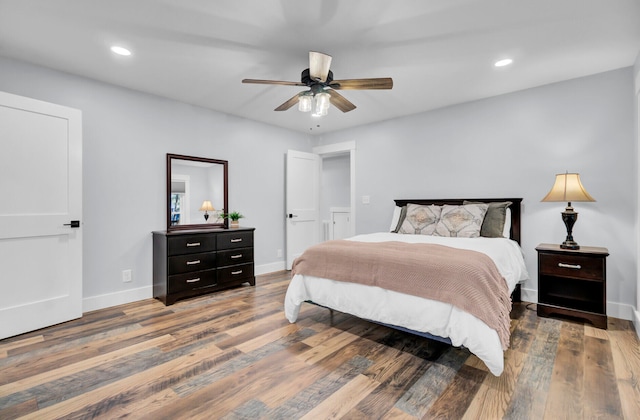 bedroom featuring hardwood / wood-style floors and ceiling fan