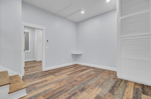 unfurnished room with dark hardwood / wood-style floors