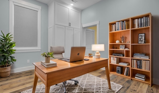 office area featuring hardwood / wood-style floors