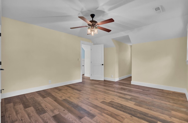 unfurnished room featuring ceiling fan and dark hardwood / wood-style floors