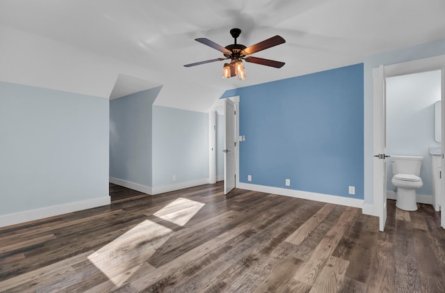 bonus room featuring ceiling fan, dark wood-type flooring, and vaulted ceiling