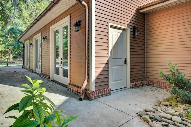 property entrance with a patio area