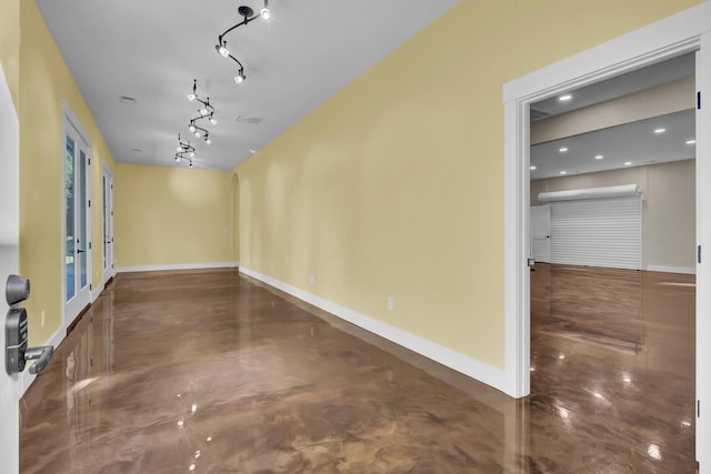 4429 Francis Younge Way, Hollywood, SC 29449 - spare room with baseboards, concrete floors, and rail lighting