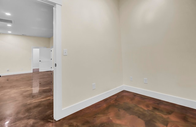 empty room featuring concrete flooring