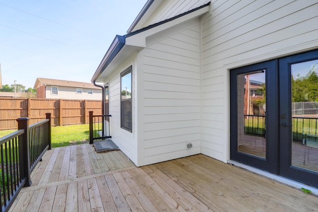 wooden deck with french doors and fence