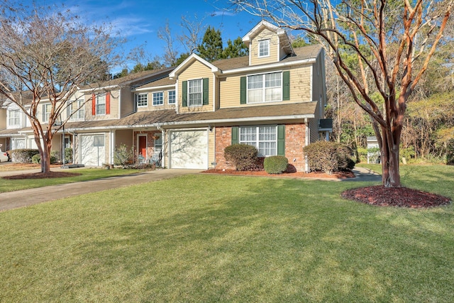 view of front of property with a front yard and a garage