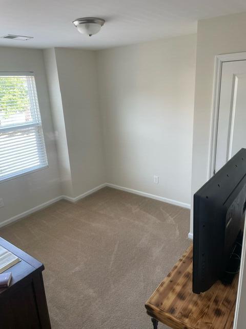 9217 Southern Oak Ln, Ladson, SC 29456 - empty room with baseboards and carpet