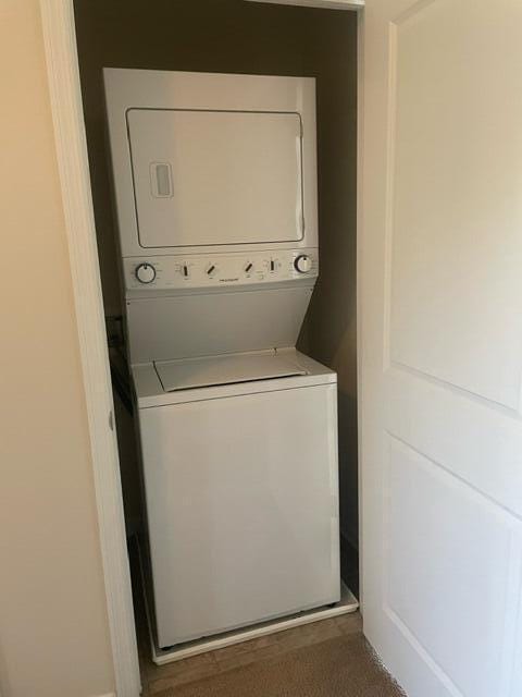 9217 Southern Oak Ln, Ladson, SC 29456 - laundry room featuring stacked washing machine and dryer