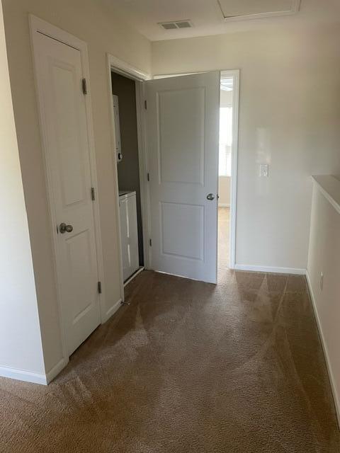 9217 Southern Oak Ln, Ladson, SC 29456 - carpeted spare room featuring baseboards and attic access
