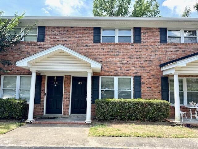 1820 Mepkin Rd Unit 1019, Charleston, SC 29407 - townhome / multi-family property featuring brick siding and a porch
