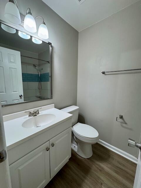 1820 Mepkin Rd Unit 1019, Charleston, SC 29407 - full bathroom featuring wood finished floors, vanity, and a shower