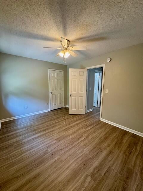 1820 Mepkin Rd Unit 1019, Charleston, SC 29407 - unfurnished room with wood finished floors, a textured ceiling, and a ceiling fan
