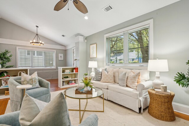 8 Tovey Rd, Charleston, SC 29407 - living room with plenty of natural light, vaulted ceiling, a chandelier, light wood-type flooring, and a ceiling fan
