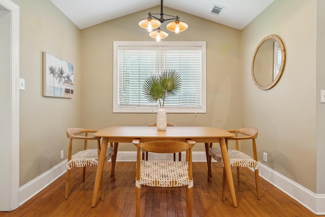 8 Tovey Rd, Charleston, SC 29407 - dining area featuring wood finished floors, vaulted ceiling, and a chandelier