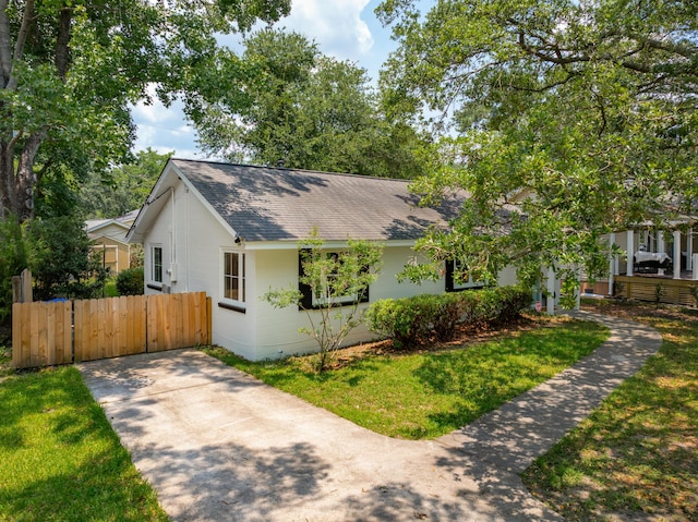 8 Tovey Rd, Charleston, SC 29407 - view of front facade featuring a shingled roof, concrete block siding, and a gate