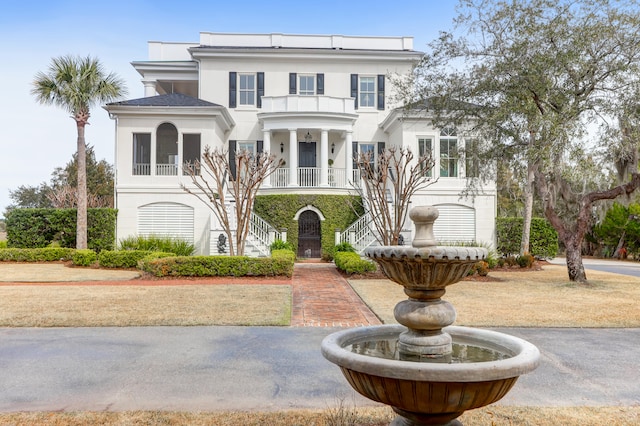 view of front of property with a balcony