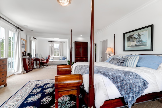 bedroom with crown molding, light colored carpet, and multiple windows