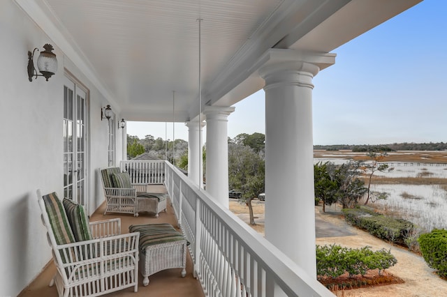 balcony featuring a porch