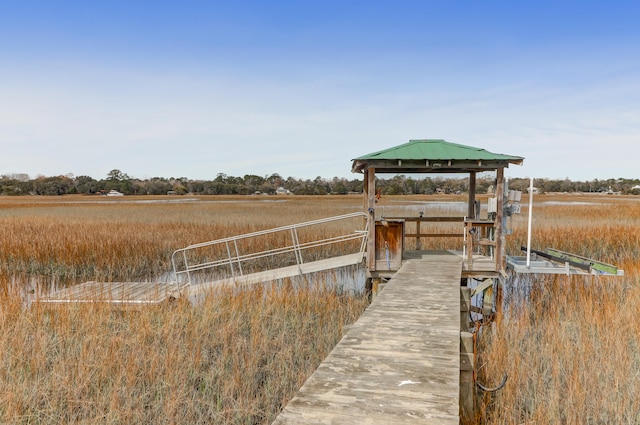 view of dock featuring a rural view