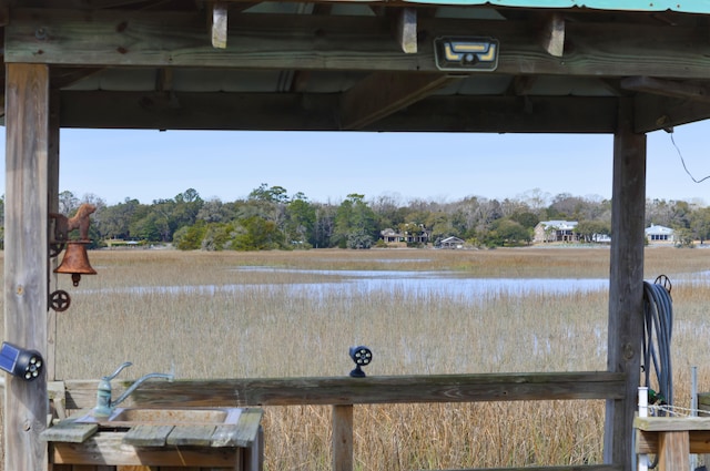 exterior space with a water view