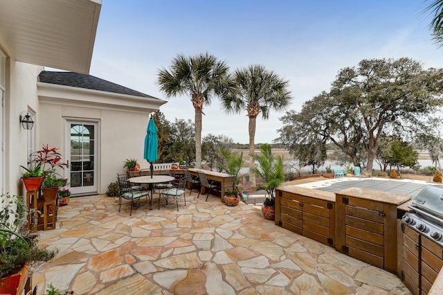 view of patio with exterior kitchen