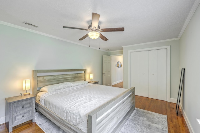 1314 Cooper Store Rd, Moncks Corner, SC 29461 - bedroom with a closet, wood finished floors, ornamental molding, baseboards, and ceiling fan