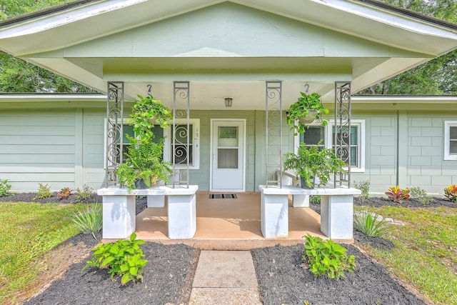 1314 Cooper Store Rd, Moncks Corner, SC 29461 - doorway to property featuring covered porch