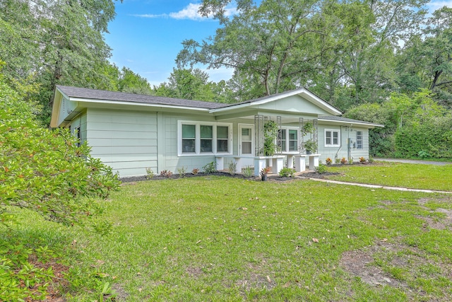 1314 Cooper Store Rd, Moncks Corner, SC 29461 - ranch-style house with a front lawn and a porch