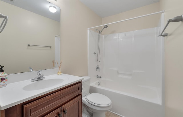 full bathroom featuring bathtub / shower combination, vanity, and toilet