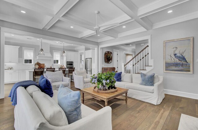 1098 Reserve Ln, Awendaw, SC 29429 - living area featuring wood finished floors, beamed ceiling, stairway, coffered ceiling, and recessed lighting