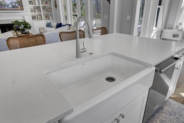 1098 Reserve Ln, Awendaw, SC 29429 - detailed view of wood finished floors and dishwasher