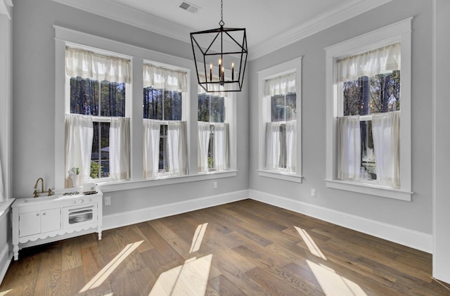1098 Reserve Ln, Awendaw, SC 29429 - unfurnished dining area with ornamental molding, a chandelier, and dark wood finished floors