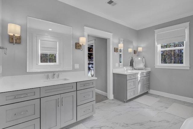 1098 Reserve Ln, Awendaw, SC 29429 - full bathroom featuring marble look tile flooring, two vanities, and crown molding
