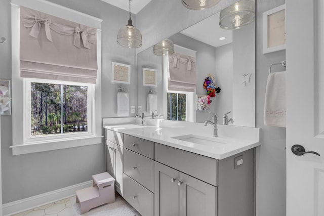 1098 Reserve Ln, Awendaw, SC 29429 - full bathroom featuring double vanity and baseboards