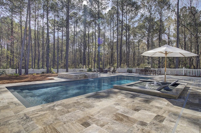 1098 Reserve Ln, Awendaw, SC 29429 - view of pool with a patio area, a fenced backyard, a wooded view, and a pool with connected hot tub