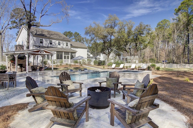 1098 Reserve Ln, Awendaw, SC 29429 - view of patio featuring an in-ground hot tub and a fire pit