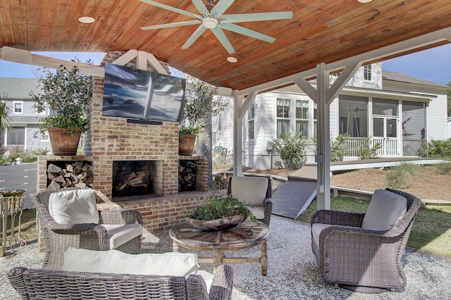 1098 Reserve Ln, Awendaw, SC 29429 - sunroom / solarium featuring a ceiling fan, lofted ceiling, and an outdoor living space with a fireplace