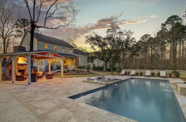 1098 Reserve Ln, Awendaw, SC 29429 - view of pool featuring a patio area, an outdoor living space with a fireplace, and a pool with connected hot tub