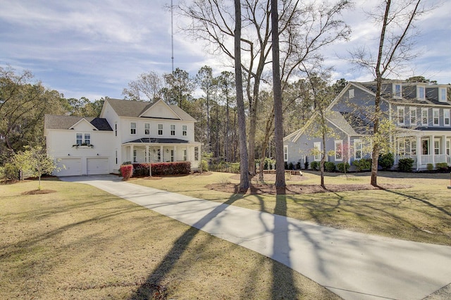 1098 Reserve Ln, Awendaw, SC 29429 - view of front of home with an attached garage, driveway, and a front yard