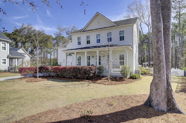 1098 Reserve Ln, Awendaw, SC 29429 - view of front of house featuring board and batten siding and covered porch