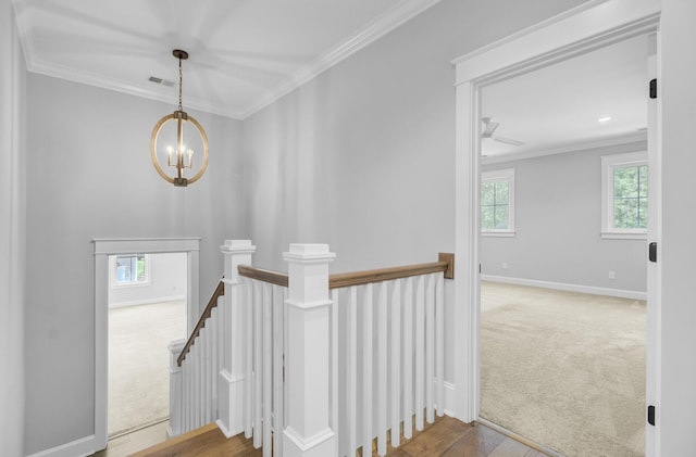 1098 Reserve Ln, Awendaw, SC 29429 - stairs with crown molding, a chandelier, healthy amount of natural light, and carpet