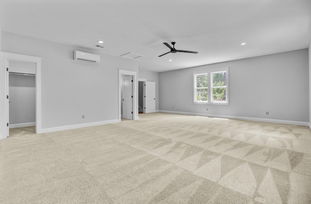 1098 Reserve Ln, Awendaw, SC 29429 - unfurnished bedroom featuring an AC wall unit, light colored carpet, recessed lighting, a walk in closet, and a ceiling fan