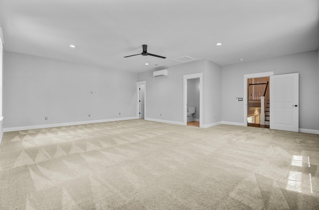 1098 Reserve Ln, Awendaw, SC 29429 - unfurnished living room featuring an AC wall unit, ceiling fan, recessed lighting, and light colored carpet