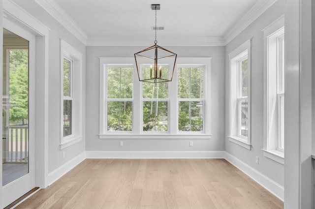1098 Reserve Ln, Awendaw, SC 29429 - unfurnished sunroom with a chandelier, healthy amount of natural light, wood finished floors, and ornamental molding