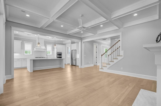 1098 Reserve Ln, Awendaw, SC 29429 - unfurnished living room with ceiling fan, light wood-style flooring, stairs, beamed ceiling, and recessed lighting